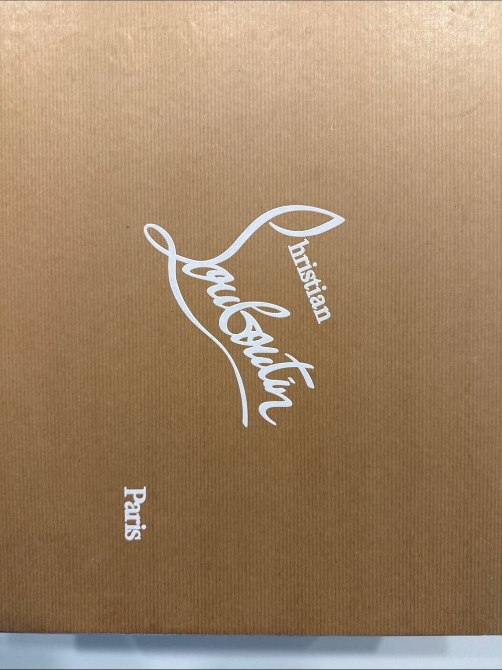 Christian Louboutin White Logo on Brown Wall Art Print